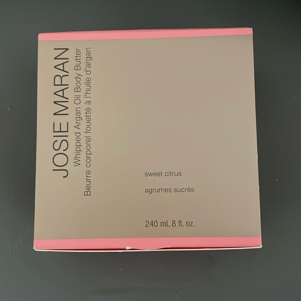 JOSIE MARAN never been opened body butter and scent sweet citrus!